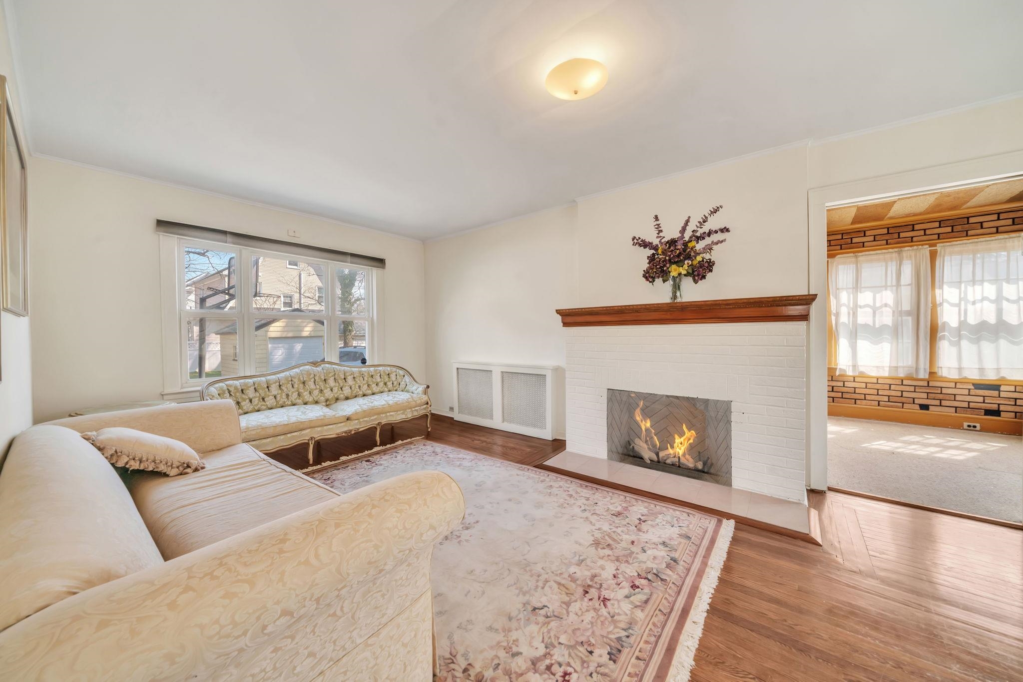 865 Livingston Road Elizabeth, NJ 07208 - Photo 20 of 39 a bedroom with a bed and a fireplace