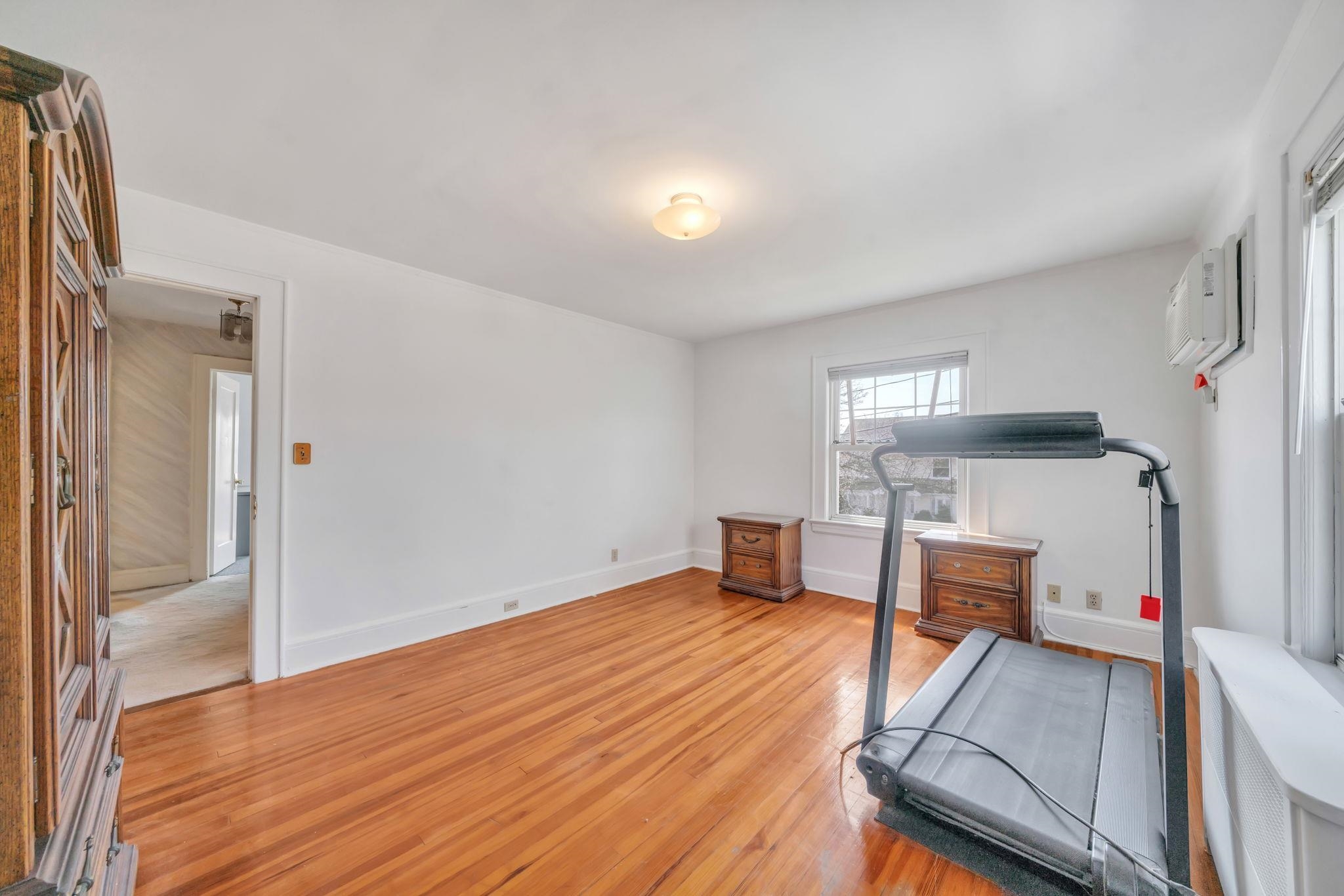 865 Livingston Road Elizabeth, NJ 07208 - Photo 23 of 39 a view of livingroom with furniture and wooden floor