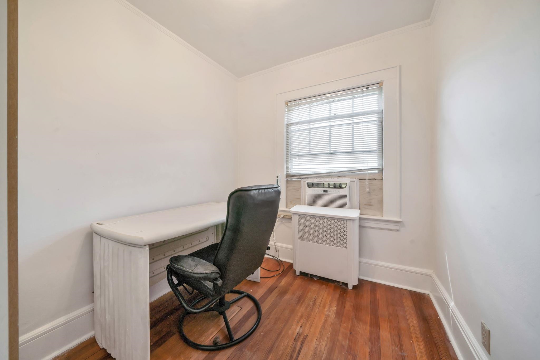 865 Livingston Road Elizabeth, NJ 07208 - Photo 26 of 39 a view of workspace with wooden floor windows