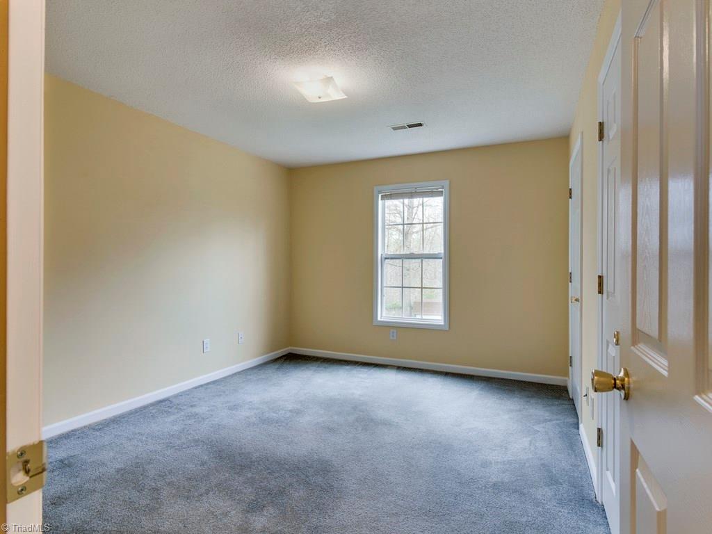 8124 Shoeline Road Stokesdale, NC 27357 - Photo 14 of 29 Bedroom 2.