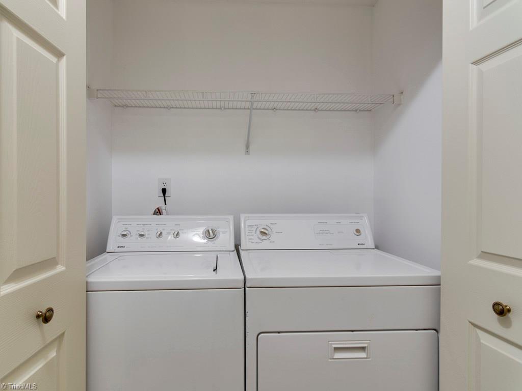 8124 Shoeline Road Stokesdale, NC 27357 - Photo 9 of 29 Washer and dryer remain with an acceptable offer.