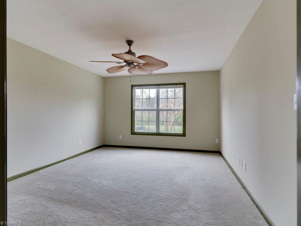 8124 Shoeline Road Stokesdale, NC 27357 - Photo 10 of 29 The master bedroom.