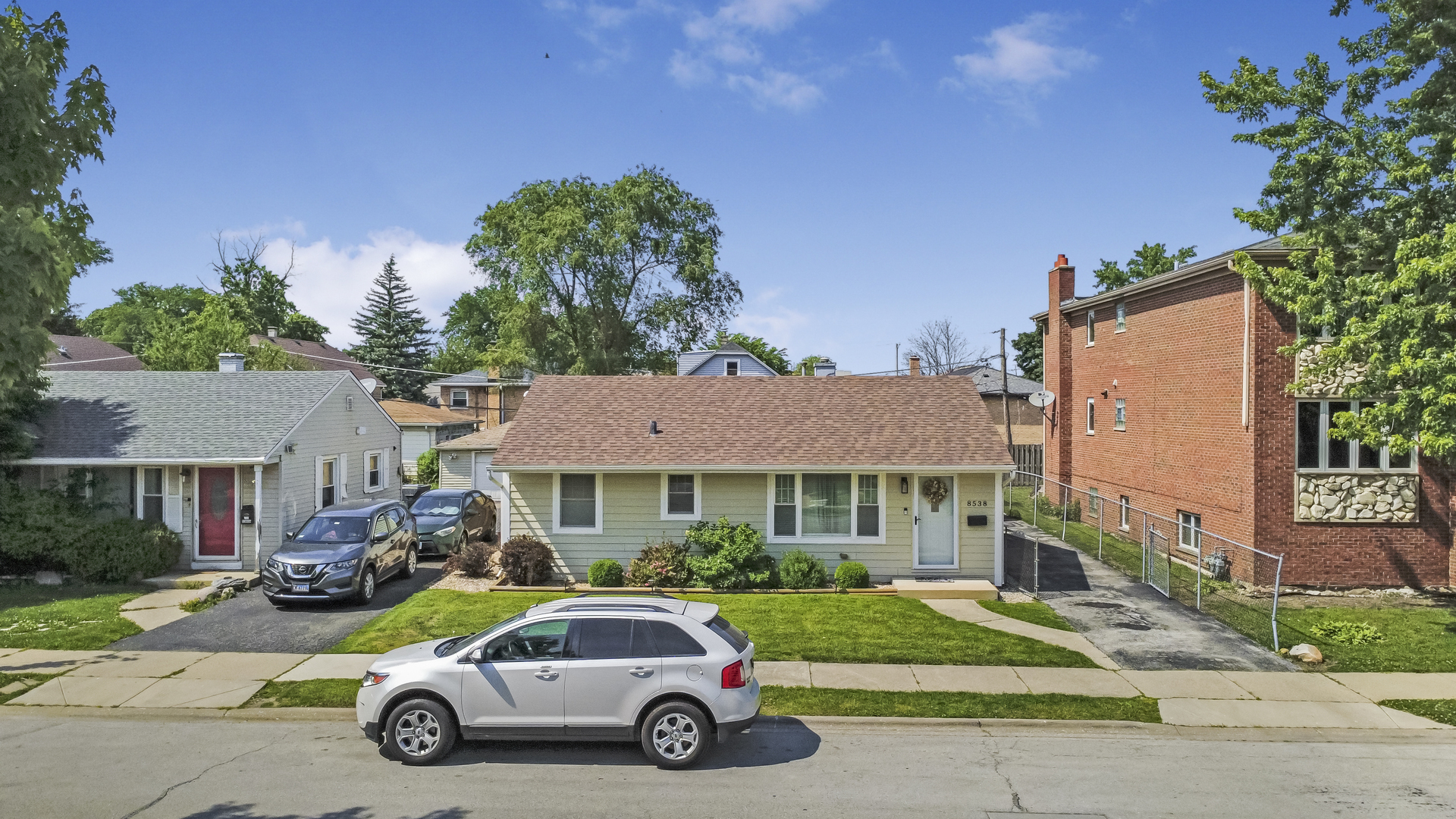 8538 45th Street Lyons, IL 60534 - Photo 2 of 29 a car parked in front of a house