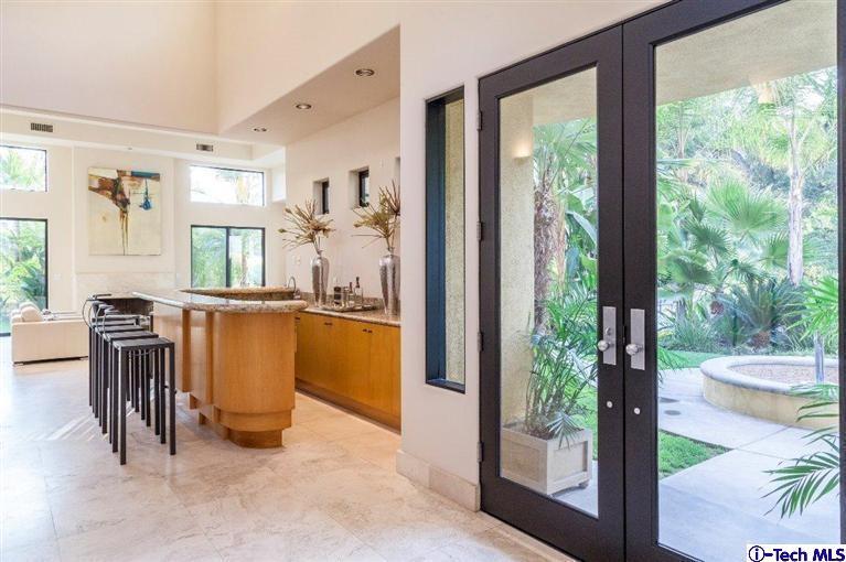 2190 Kinneloa Canyon Road Pasadena, CA 91107 - Photo 2 of 24 a view of kitchen with furniture and floor to ceiling window