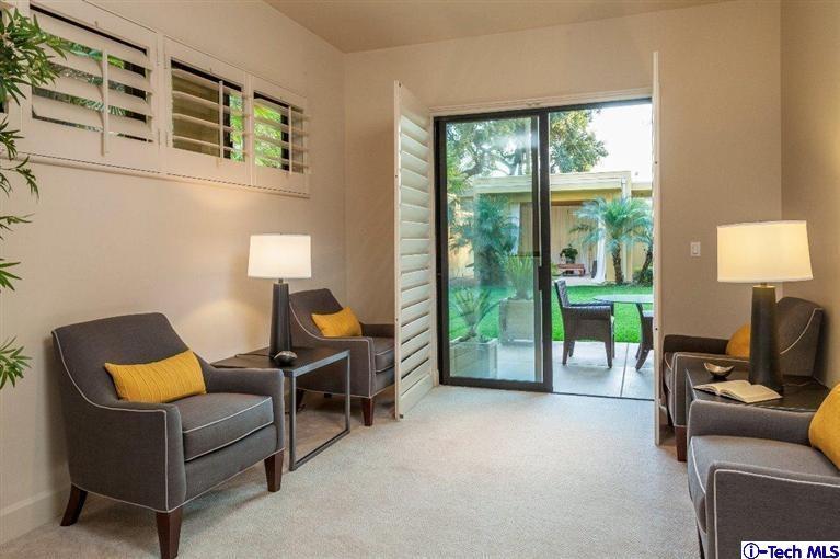 2190 Kinneloa Canyon Road Pasadena, CA 91107 - Photo 15 of 24 a living room with furniture and a lamp