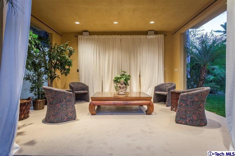 2190 Kinneloa Canyon Road Pasadena, CA 91107 - Photo 18 of 24 a living room with furniture and a potted plant