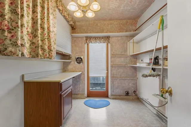 a view of an empty room with window