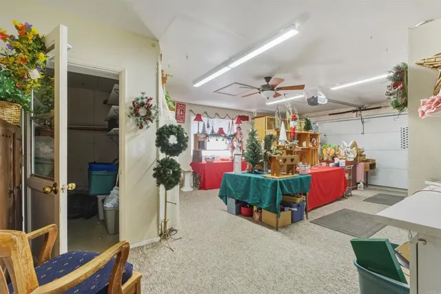 a view of balcony with chairs and table in patio