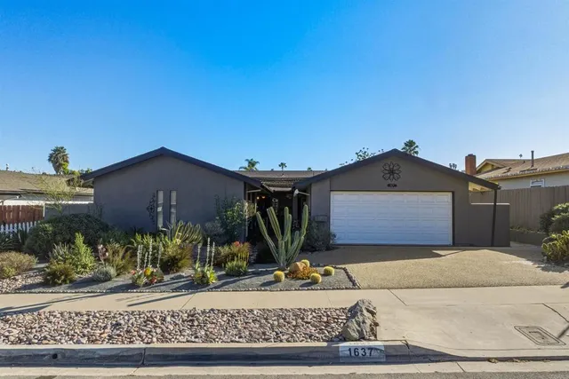 a vase of flowers sitting on a table