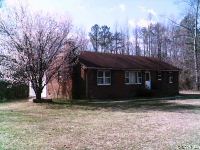 14383 Verdon Road Beaverdam, VA 23015 - Photo 1 of 1 a house that has a tree in front of it