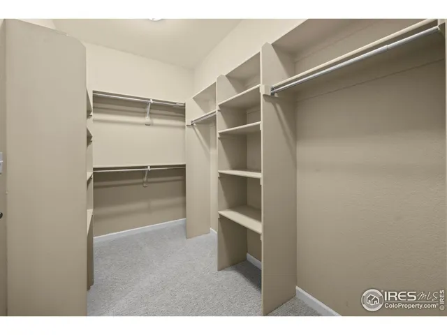 a room with cabinets and a closet