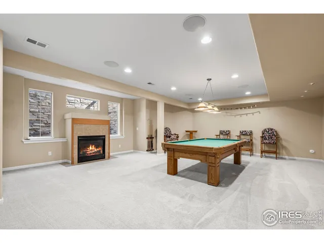 a lobby with furniture and a table