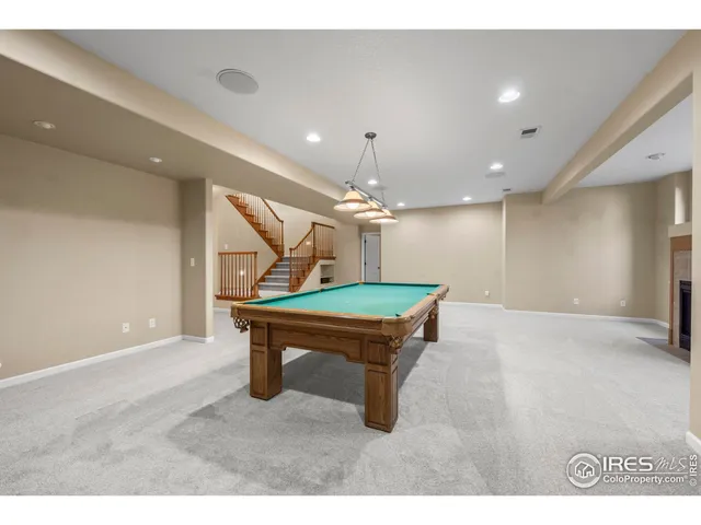 a room with furniture and a flat screen tv