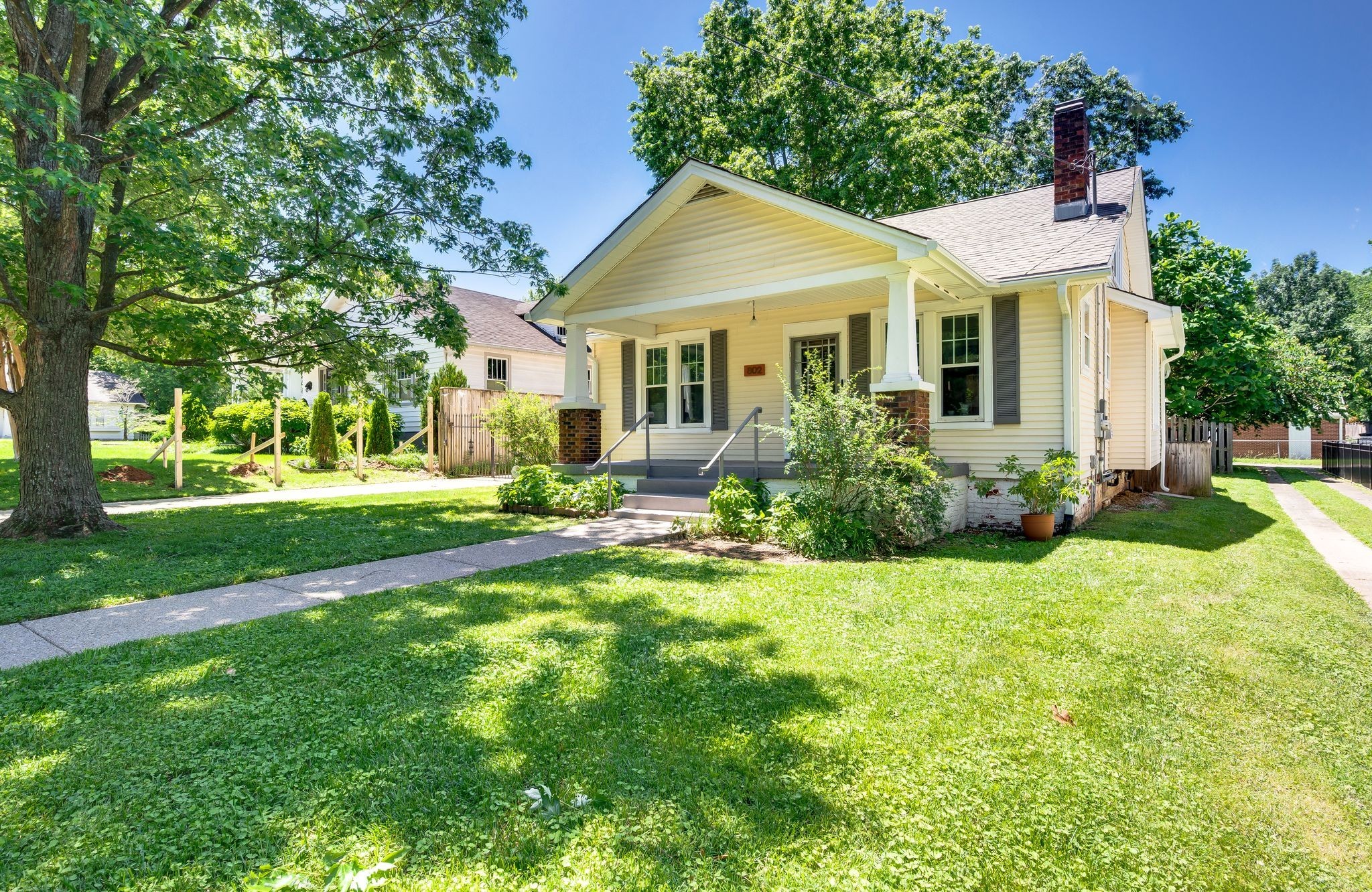802 North 16th Street Nashville, TN 37206 - Photo 1 of 44 a view of house with a big yard and potted plants