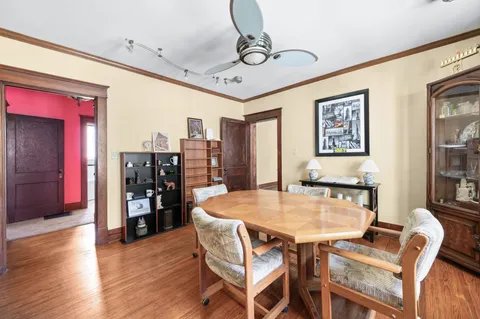 a kitchen with stainless steel appliances a refrigerator sink and cabinets