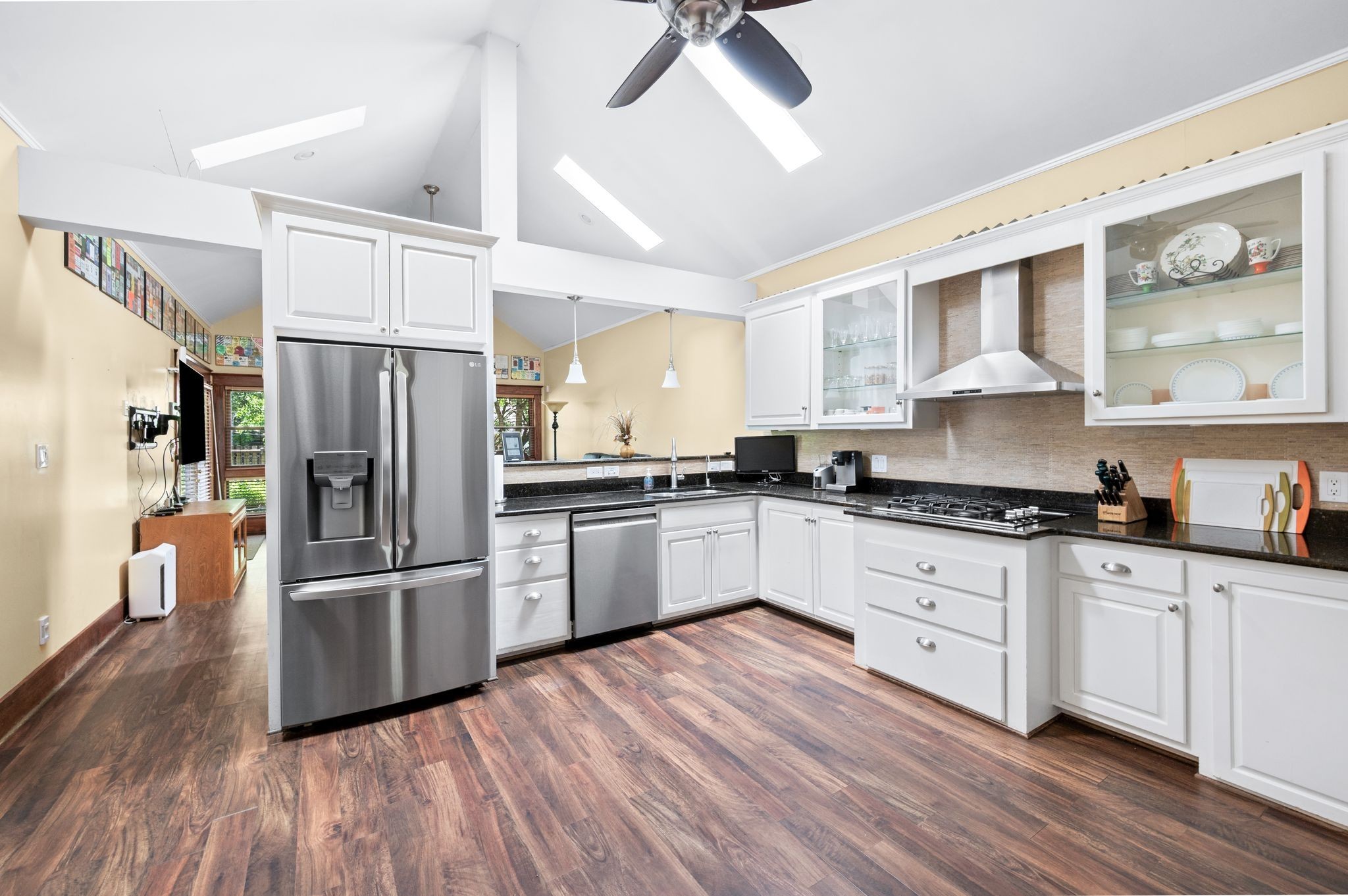 802 North 16th Street Nashville, TN 37206 - Photo 16 of 44 a kitchen with stainless steel appliances a refrigerator sink and cabinets