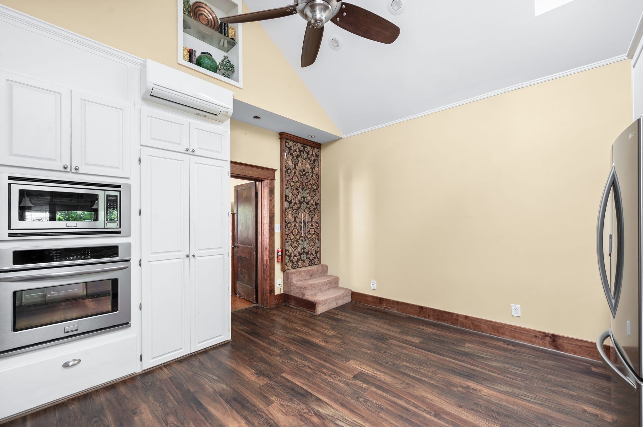 802 North 16th Street Nashville, TN 37206 - Photo 20 of 44 a view of a kitchen with wooden floor and electronic appliances