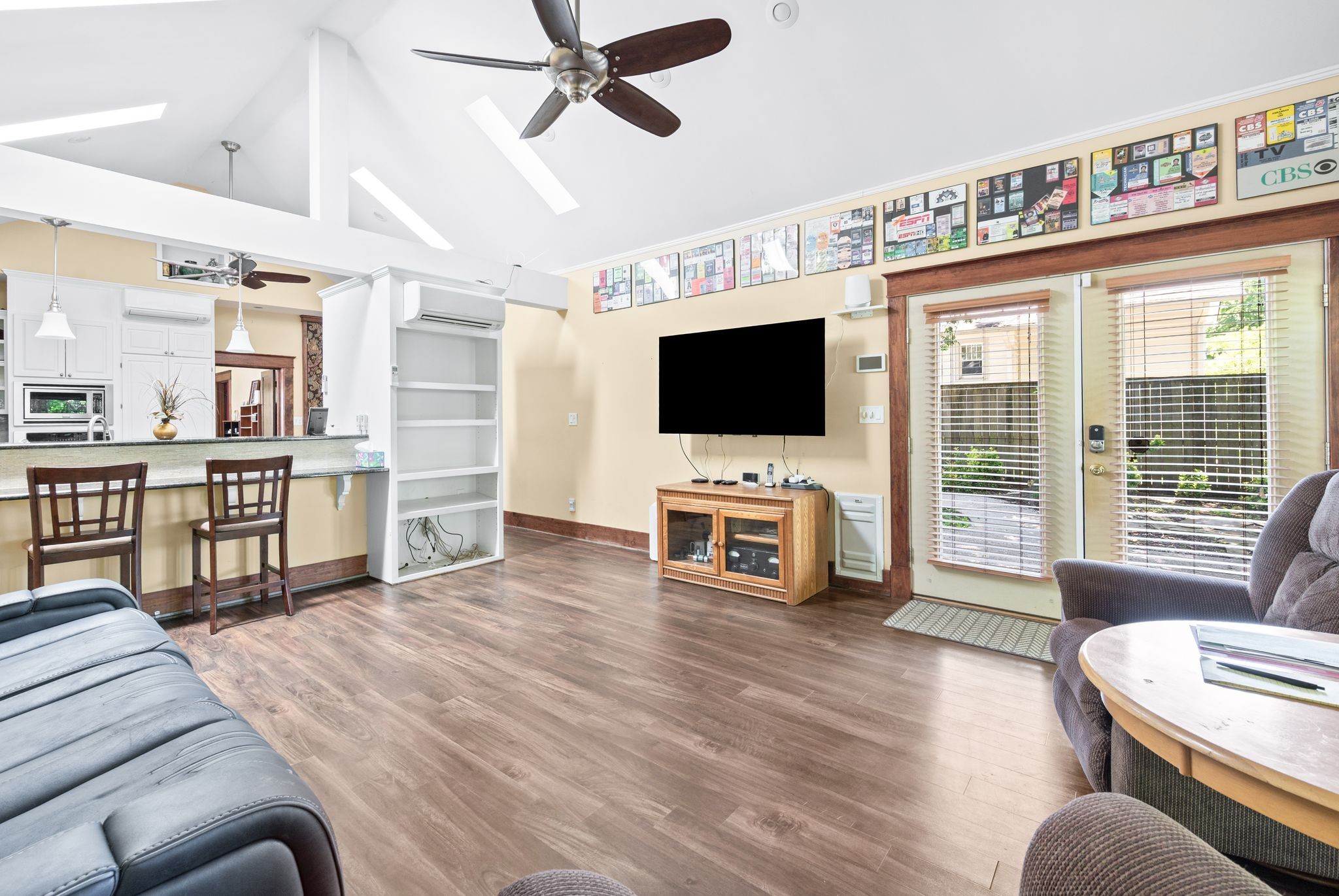 802 North 16th Street Nashville, TN 37206 - Photo 24 of 44 a living room with furniture and a flat screen tv