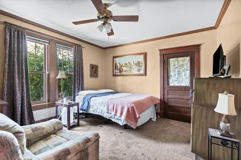 a view of entryway with livingroom and wooden floor