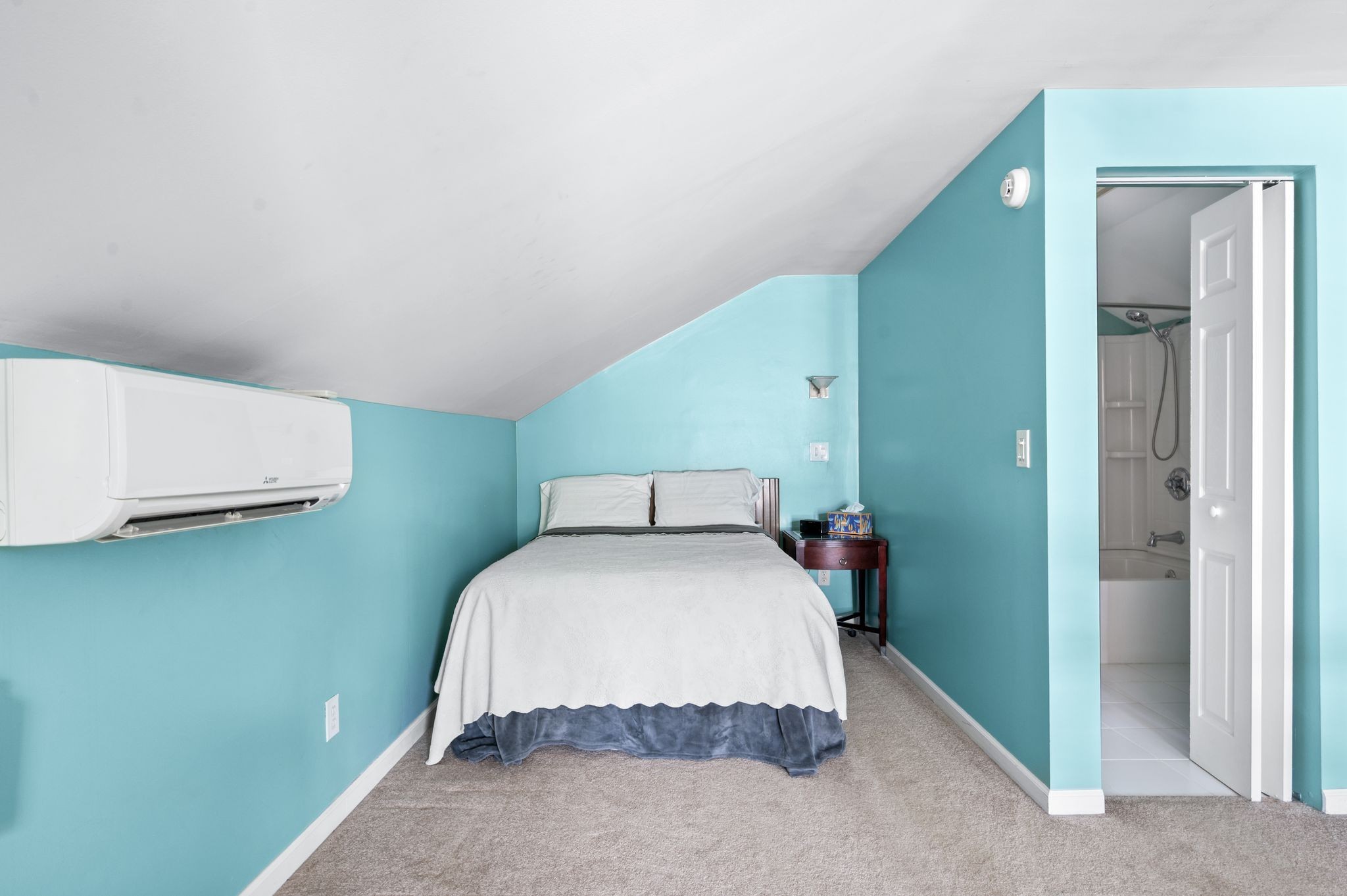 802 North 16th Street Nashville, TN 37206 - Photo 35 of 44 a bedroom with a bed and a refrigerator