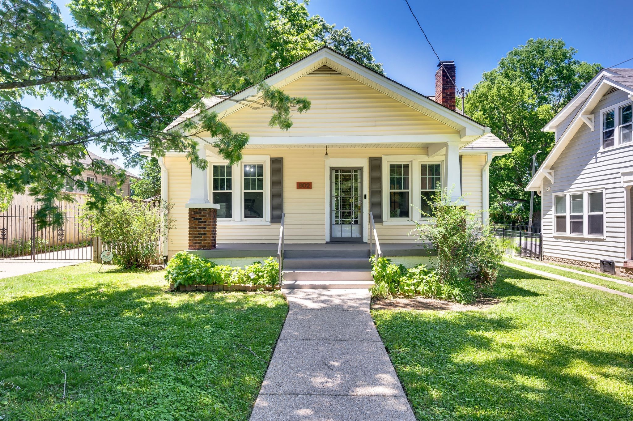 802 North 16th Street Nashville, TN 37206 - Photo 4 of 44 a front view of a house with a yard