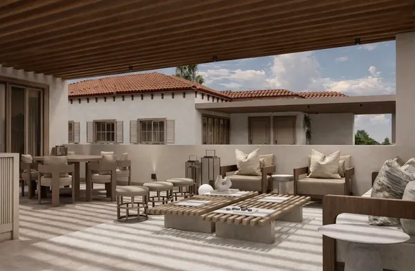 a outdoor space with patio the couches and a dining table with chairs