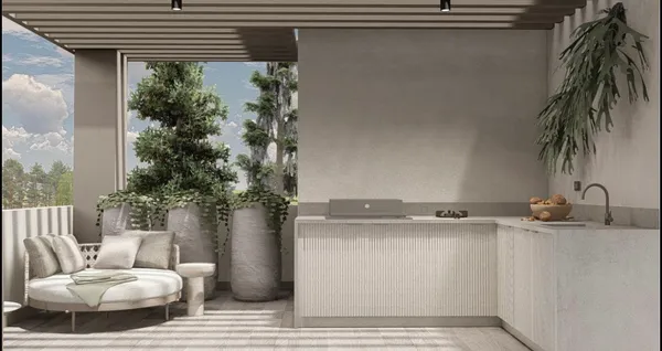 a living room with furniture and a potted plant
