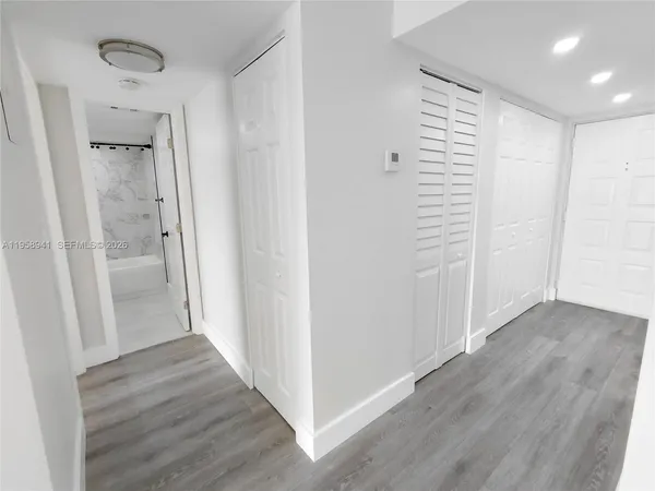 a bathroom with a sink a toilet and a bathtub