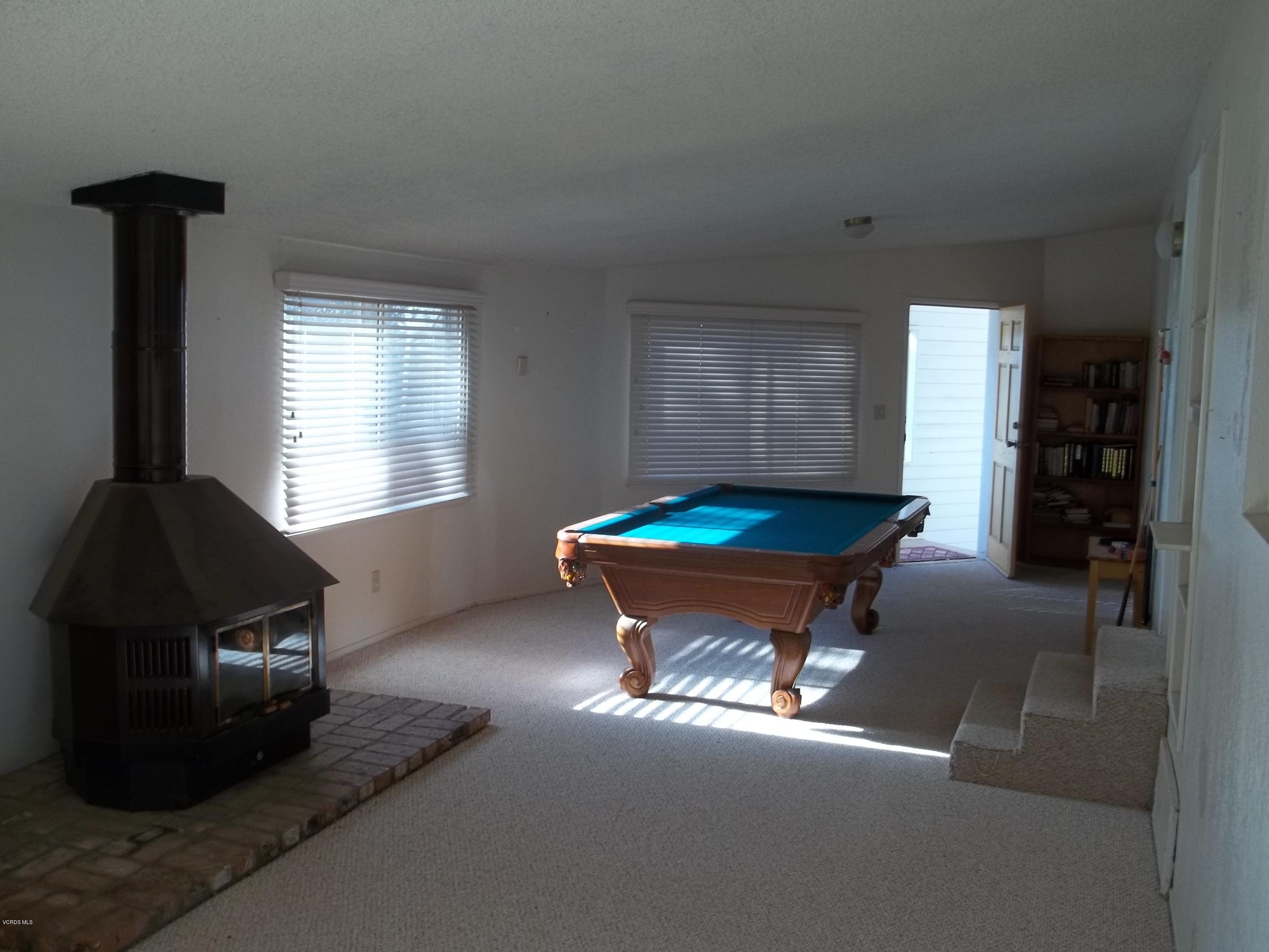 19370 Water Canyon Road Tehachapi, CA 93561 - Photo 11 of 38 a room with furniture and window