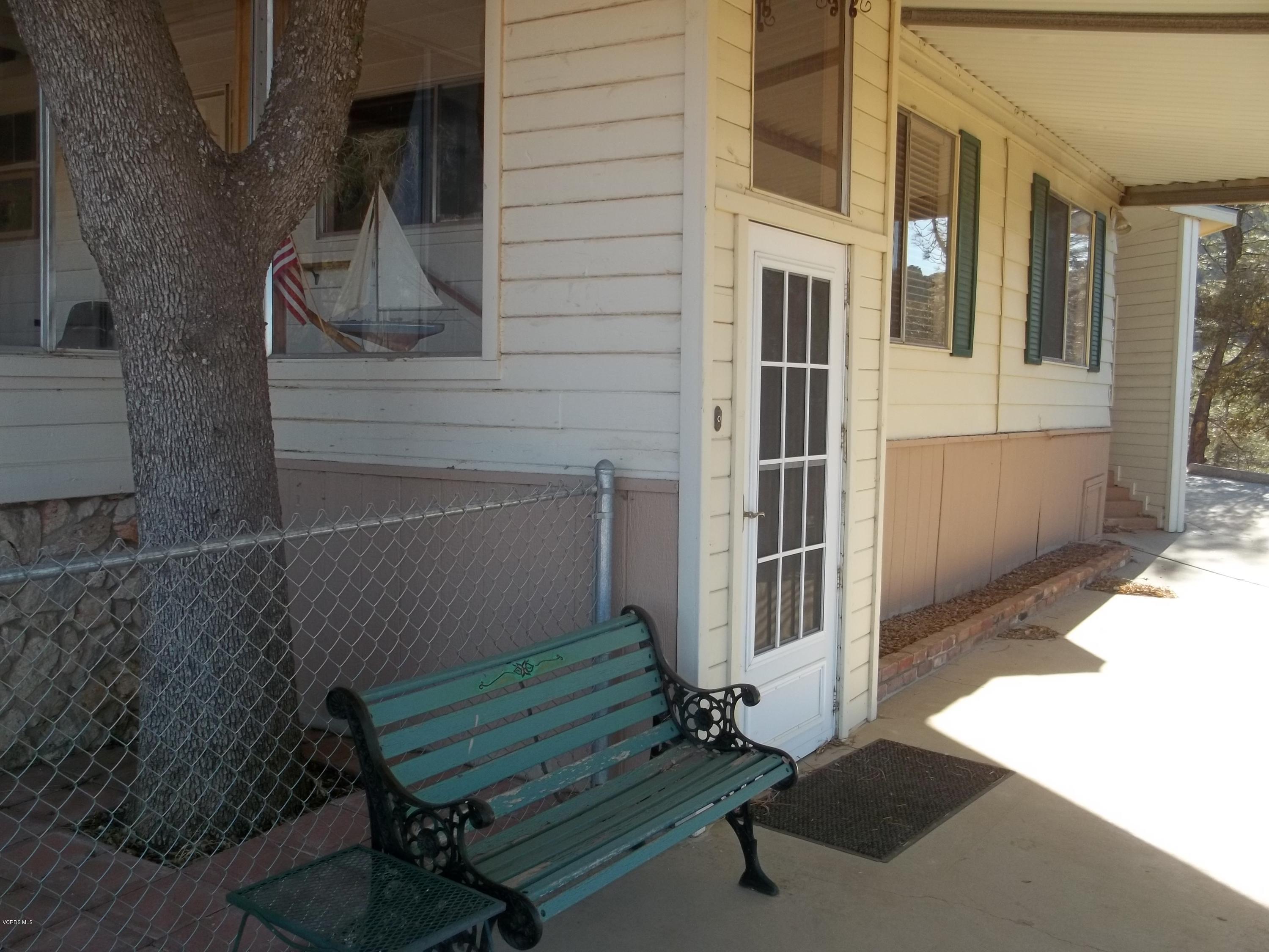 19370 Water Canyon Road Tehachapi, CA 93561 - Photo 14 of 38 a view of outdoor space deck and living room