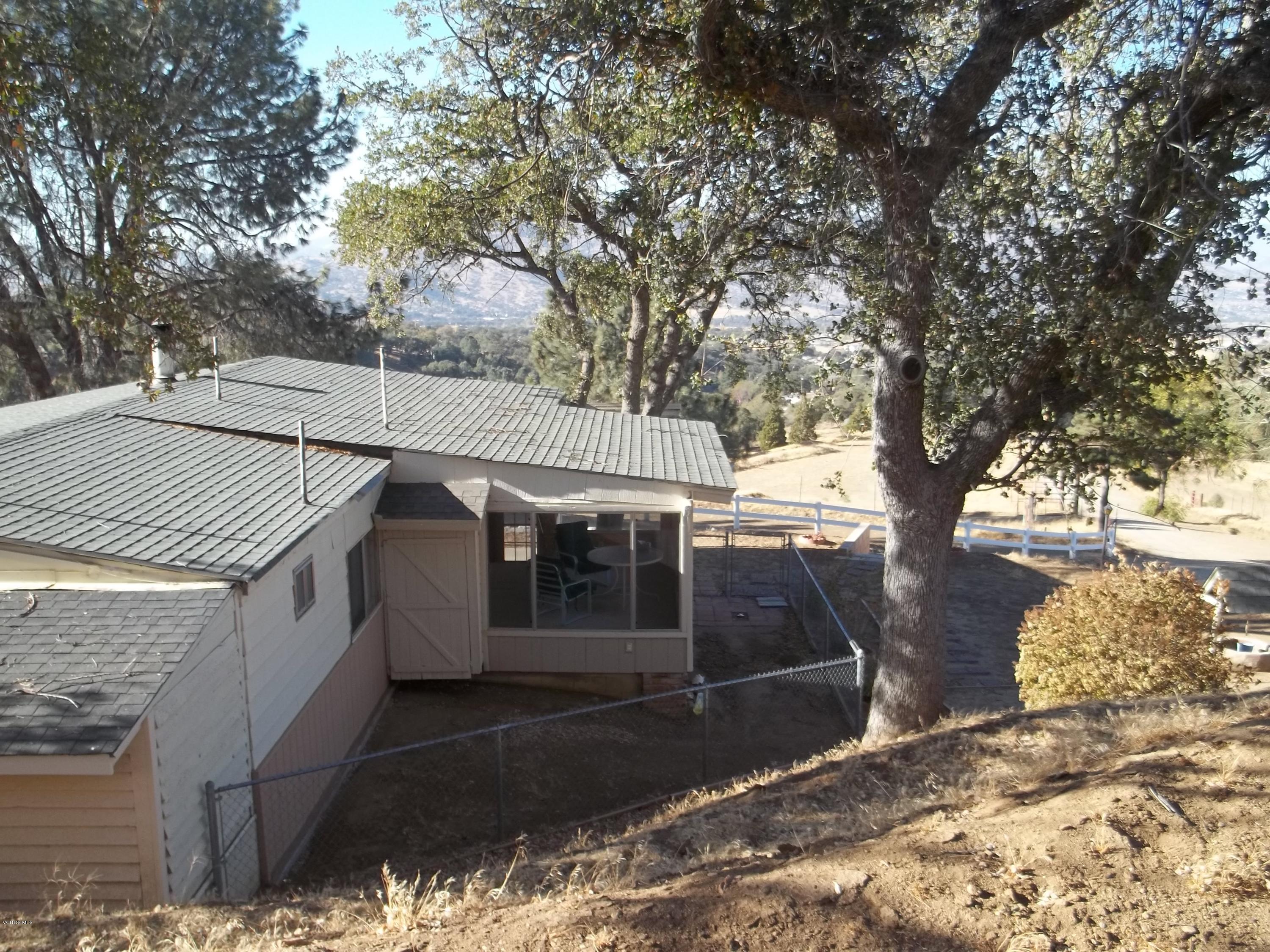 19370 Water Canyon Road Tehachapi, CA 93561 - Photo 19 of 38 a view of a house with a yard