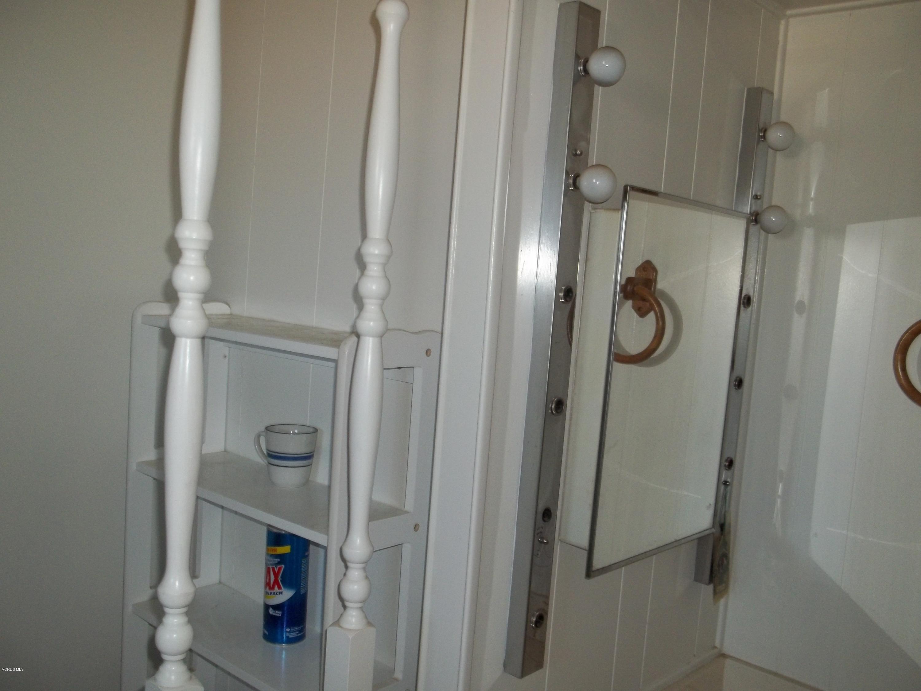 19370 Water Canyon Road Tehachapi, CA 93561 - Photo 20 of 38 a bathroom with a shower and mirror