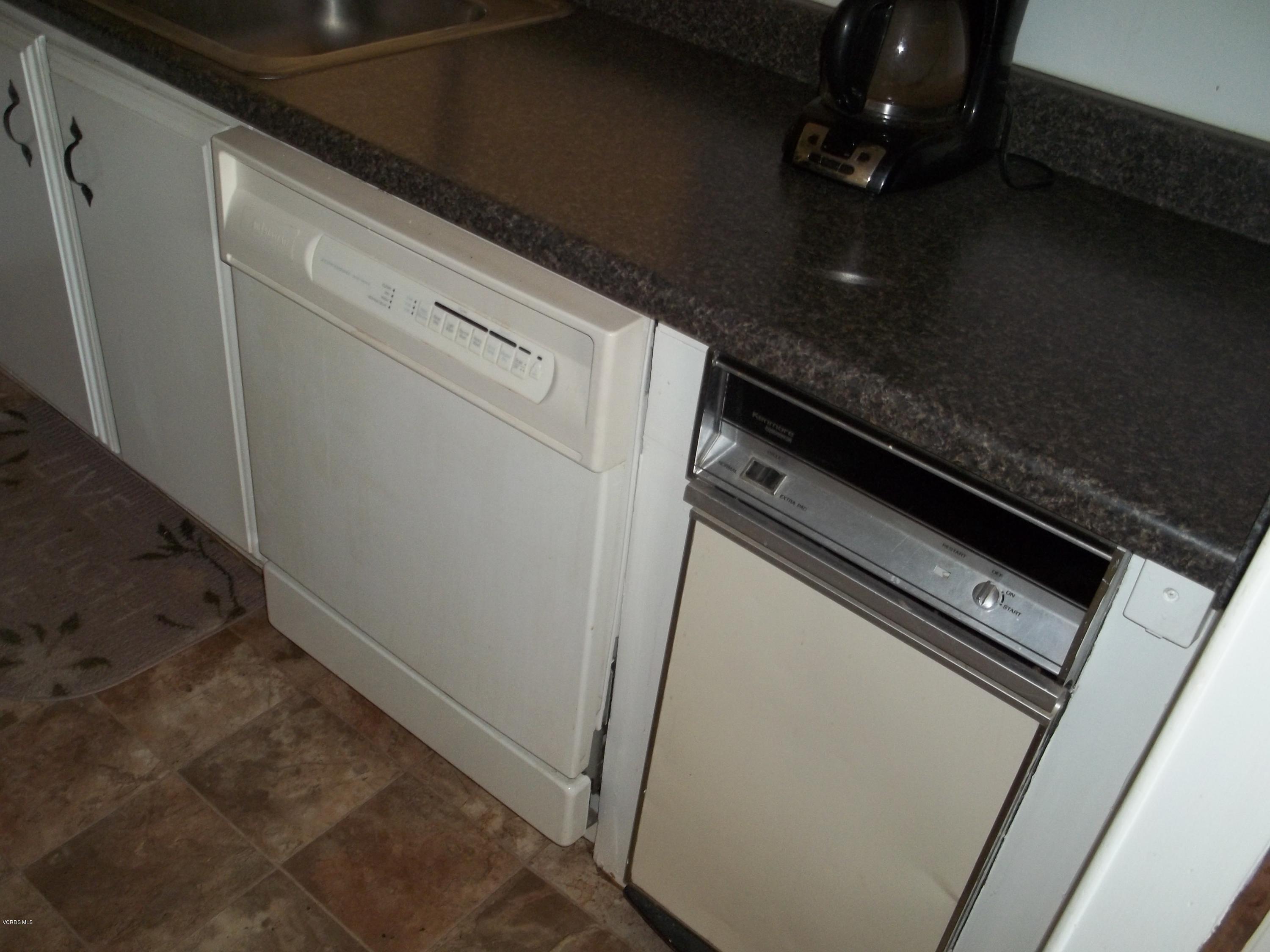 19370 Water Canyon Road Tehachapi, CA 93561 - Photo 22 of 38 a close up of a microwave