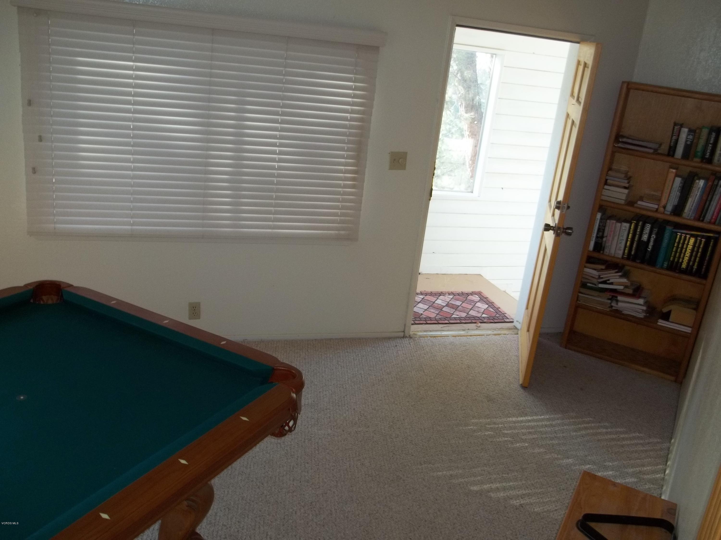 19370 Water Canyon Road Tehachapi, CA 93561 - Photo 29 of 38 a view of room with window and stairs