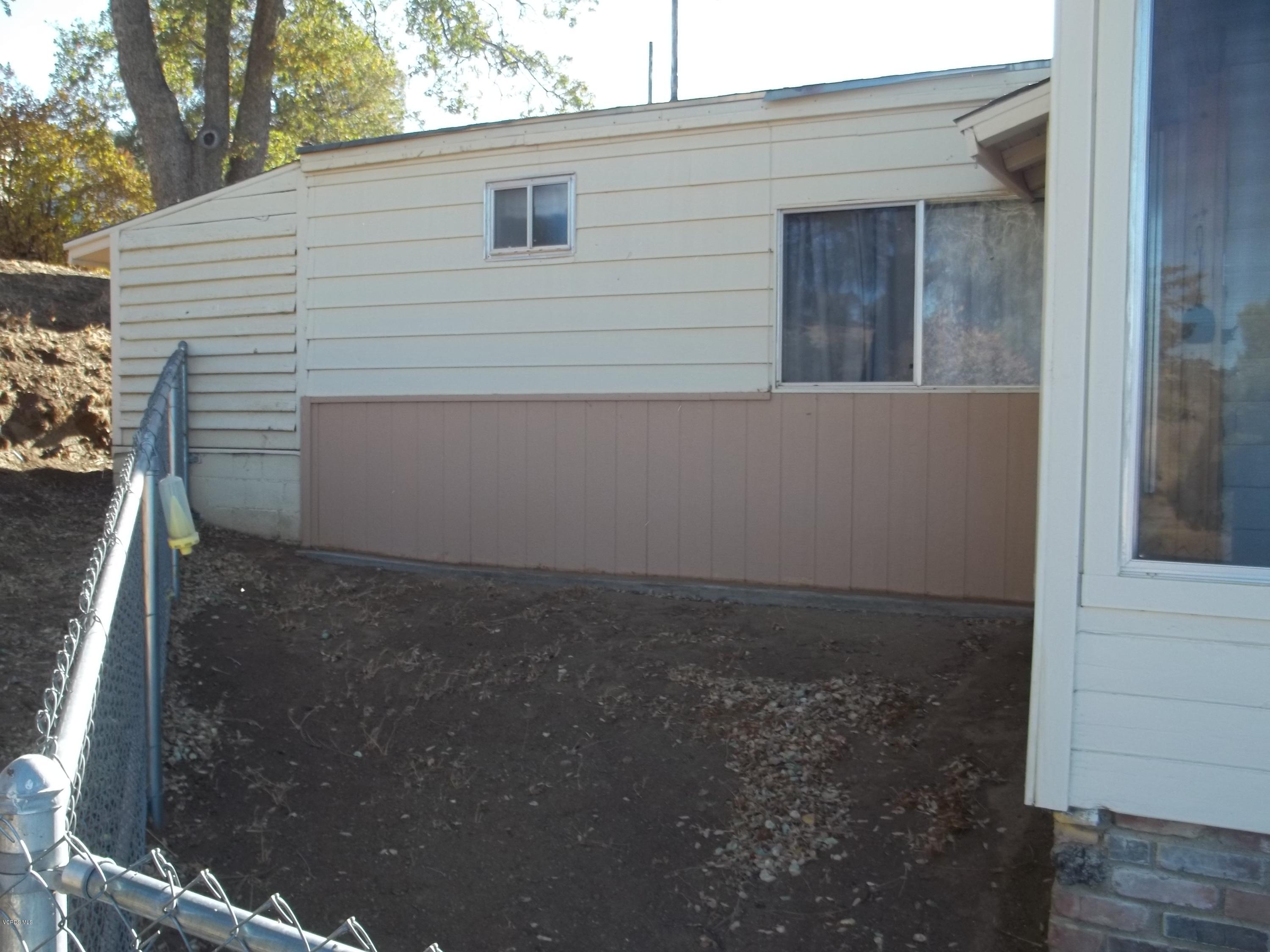 19370 Water Canyon Road Tehachapi, CA 93561 - Photo 31 of 38 a view of backyard and tree