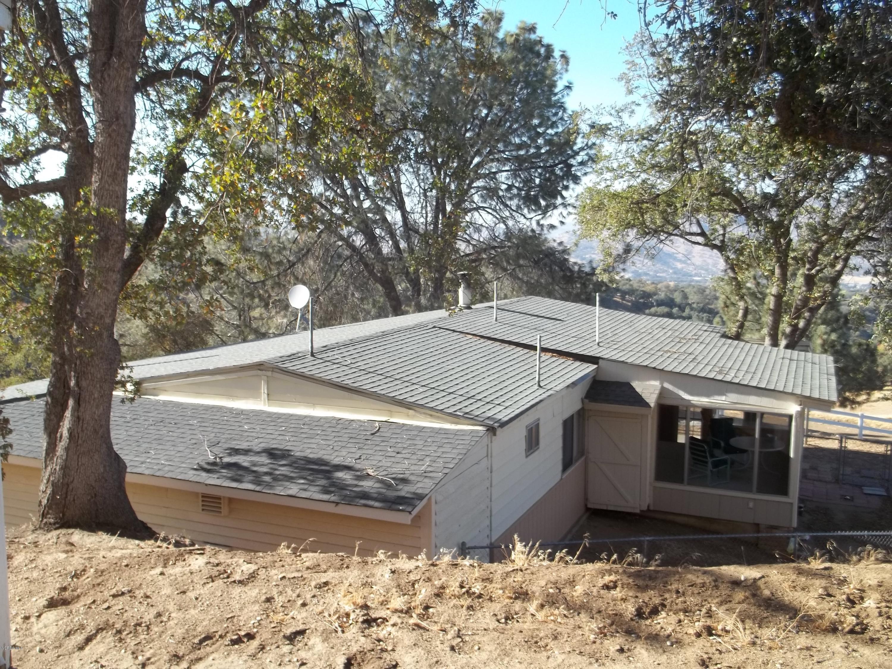 19370 Water Canyon Road Tehachapi, CA 93561 - Photo 36 of 38 a view of a house with a yard