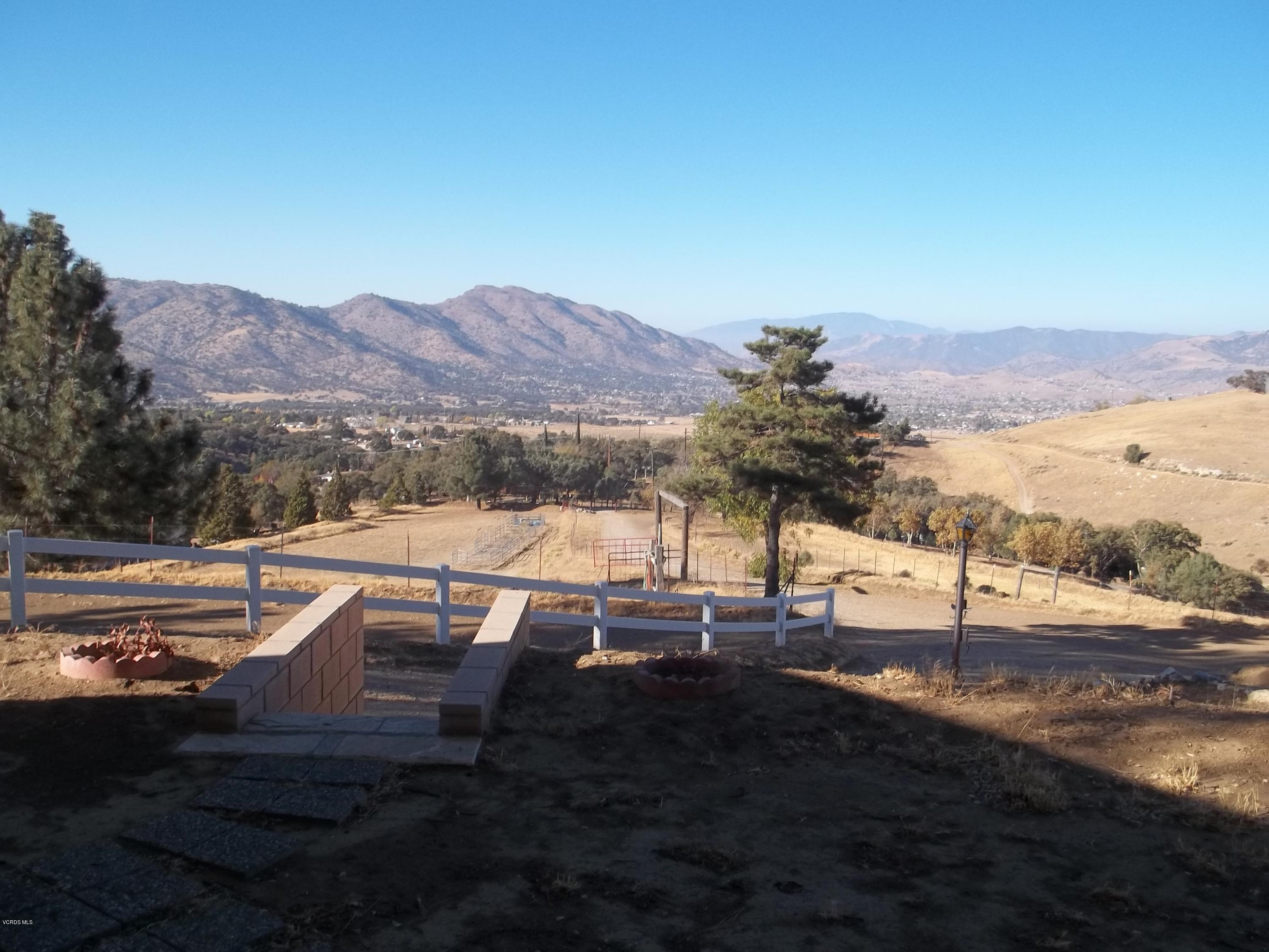 19370 Water Canyon Road Tehachapi, CA 93561 - Photo 6 of 38 a view of swimming pool with a table and chairs