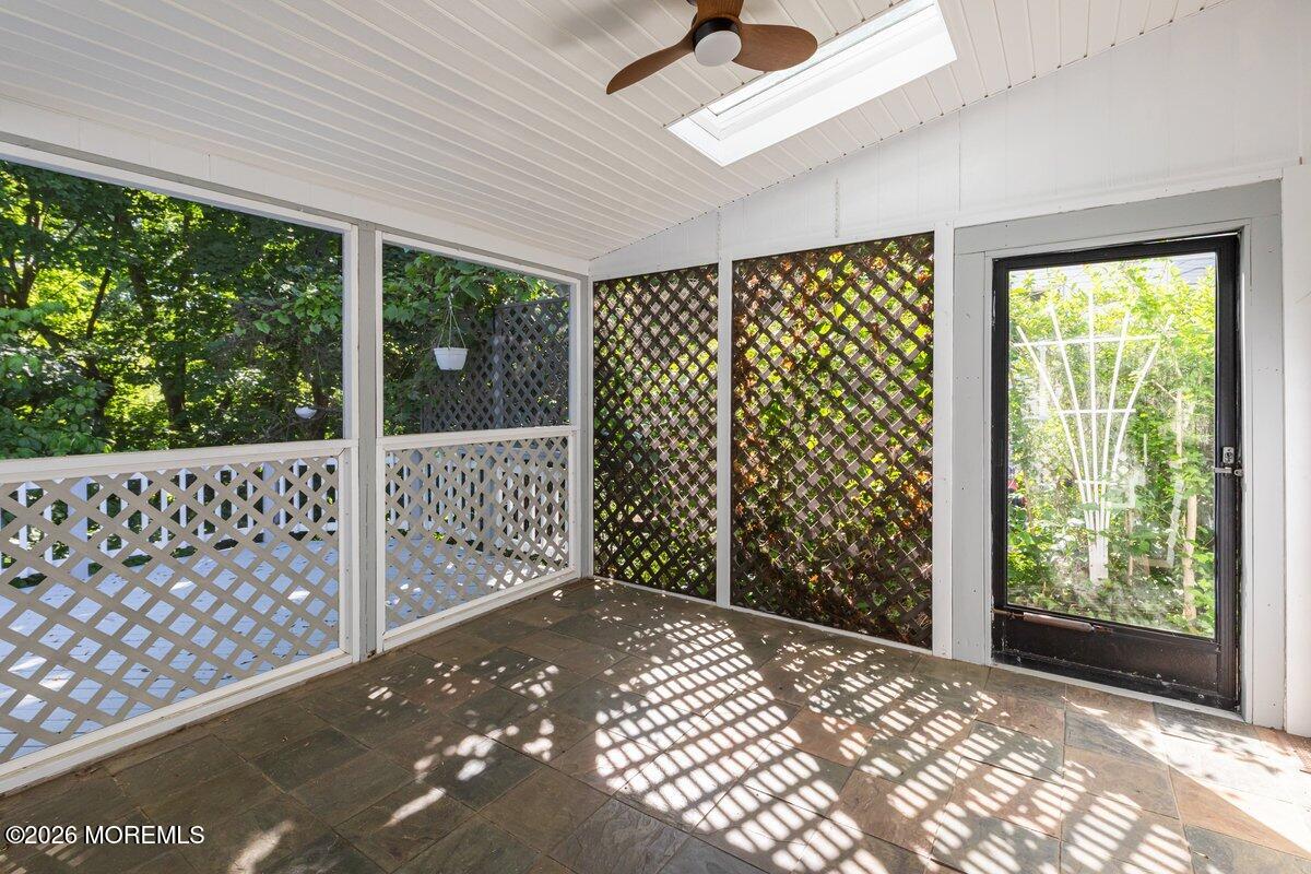 48 Ravine Drive Matawan, NJ 07747 - Photo 25 of 31 Rear Enlosed Porch