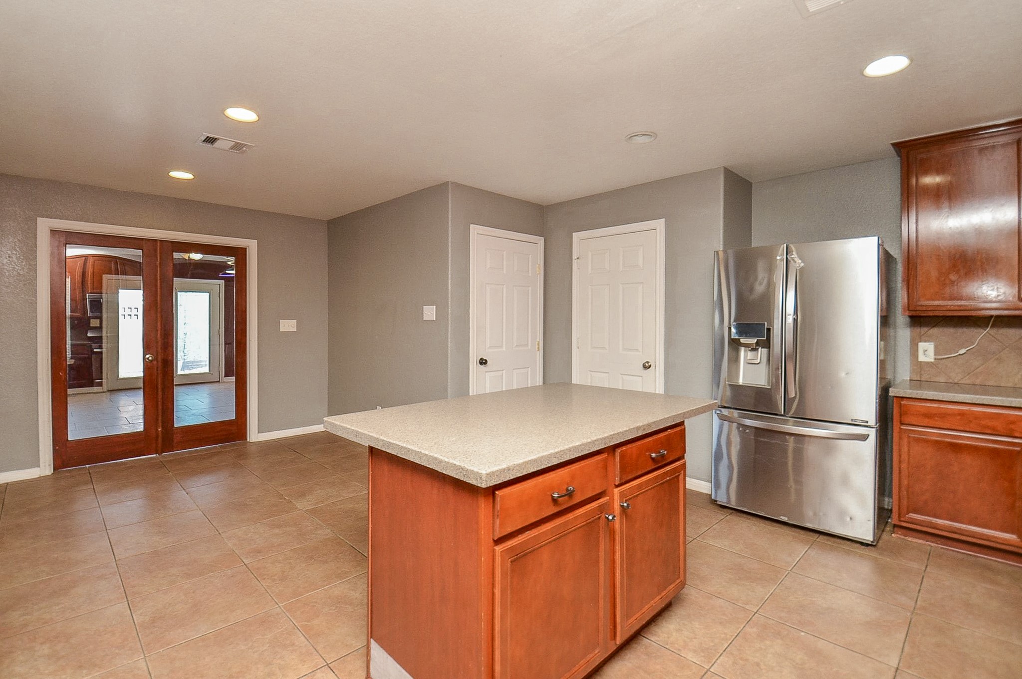 5411 Rio Drive Baytown, TX 77521 - Photo 11 of 30 This light-filled kitchen features a perfect blend of functionality and warmth, ideal for both daily living and entertaining.