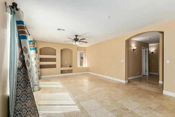 a view of a livingroom with a staircase