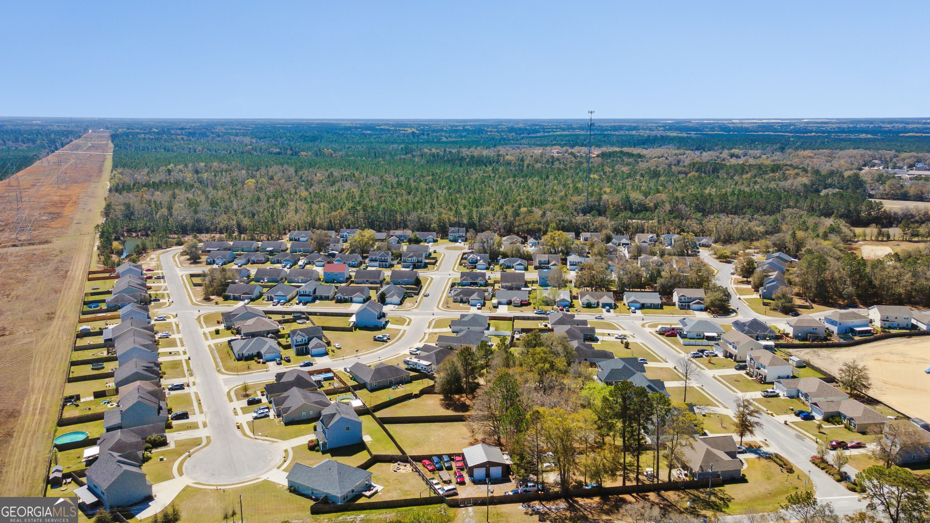 717 Noel C Conaway Road Guyton, GA 31312 - Photo 11 of 15 a view of city and mountain
