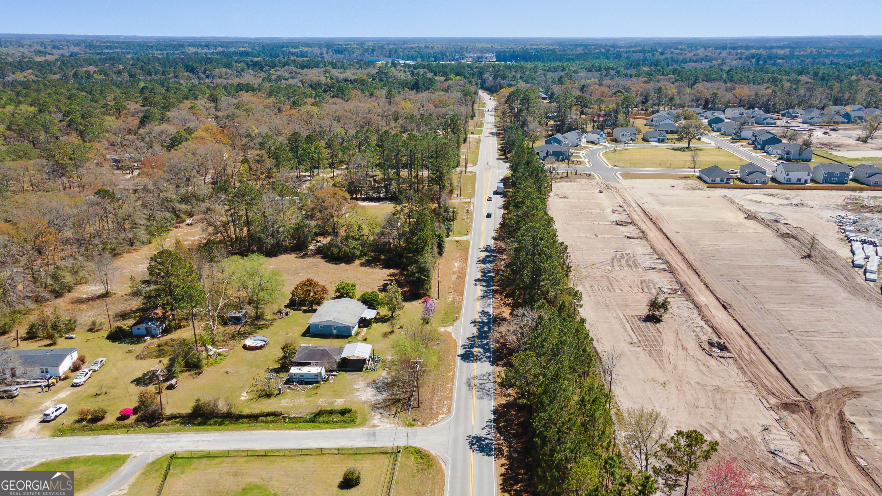 717 Noel C Conaway Road Guyton, GA 31312 - Photo 2 of 15 a view of a city