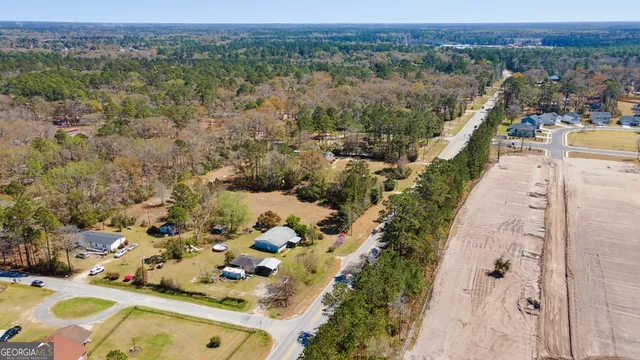 an aerial view of residential house with outdoor space