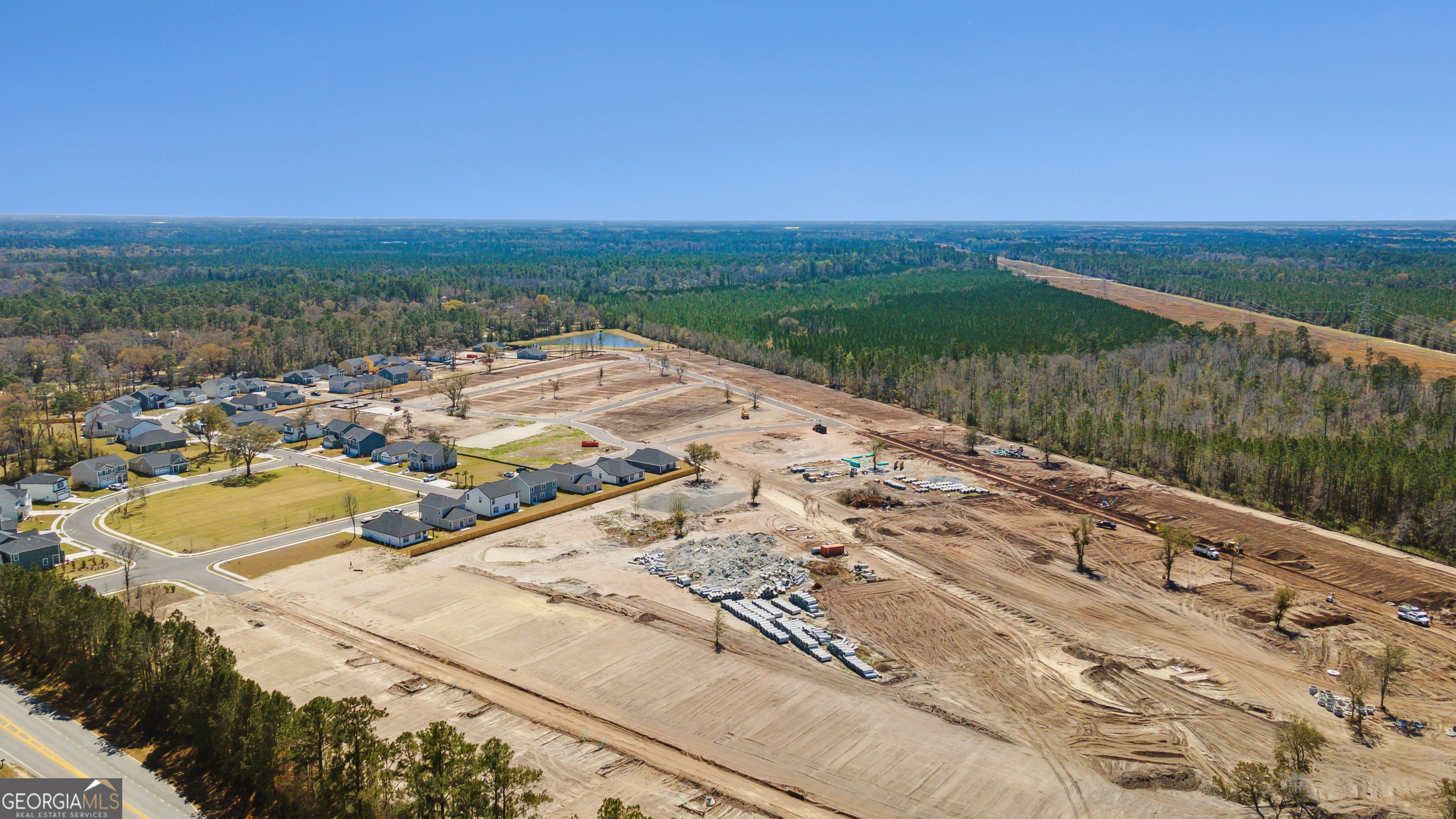 717 Noel C Conaway Road Guyton, GA 31312 - Photo 9 of 15 a view of a lake with a outdoor space