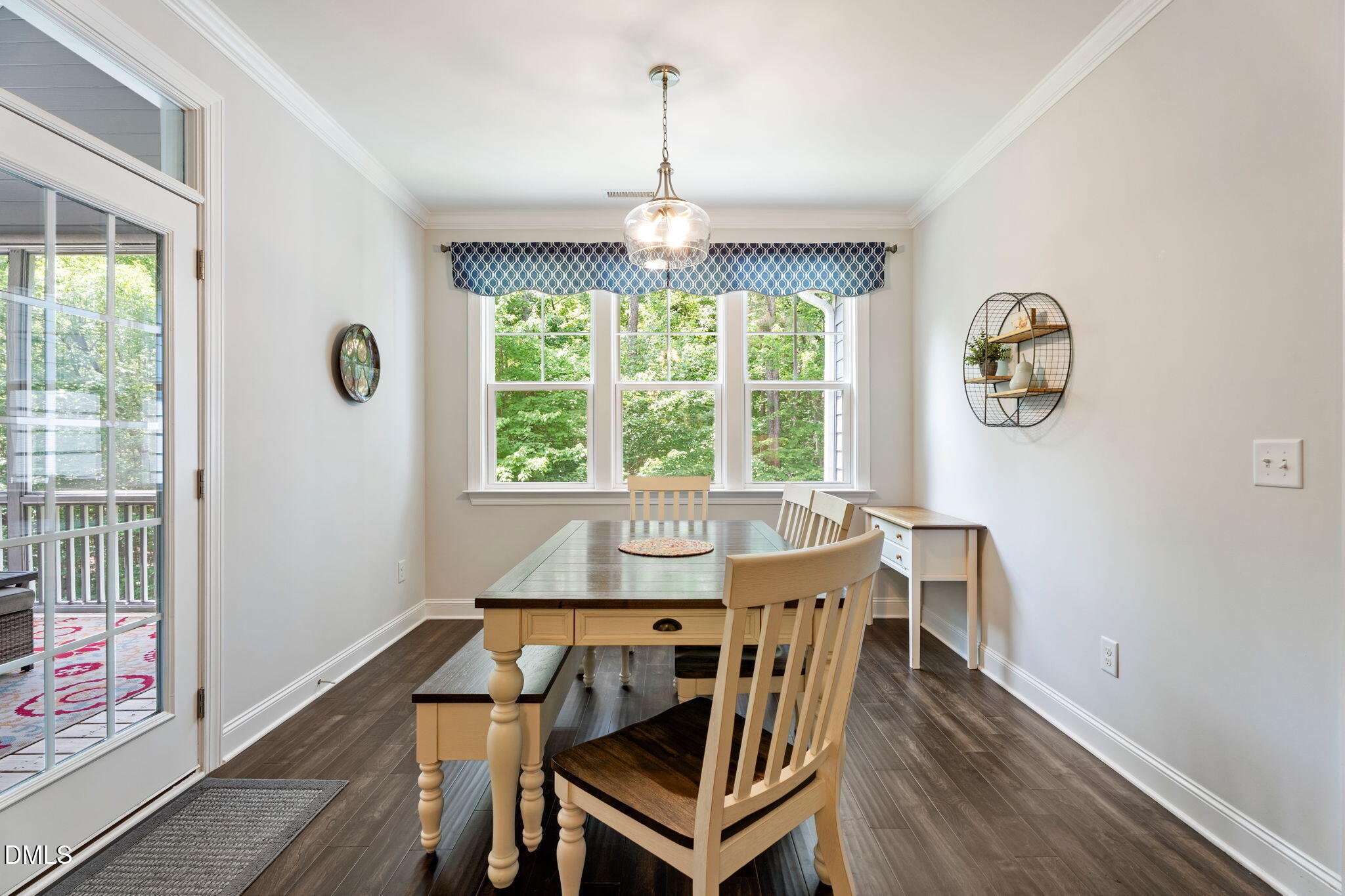 223 Colonial Ridge Drive Pittsboro, NC 27312 - Photo 13 of 47 a view of a dining room with furniture window and outside view