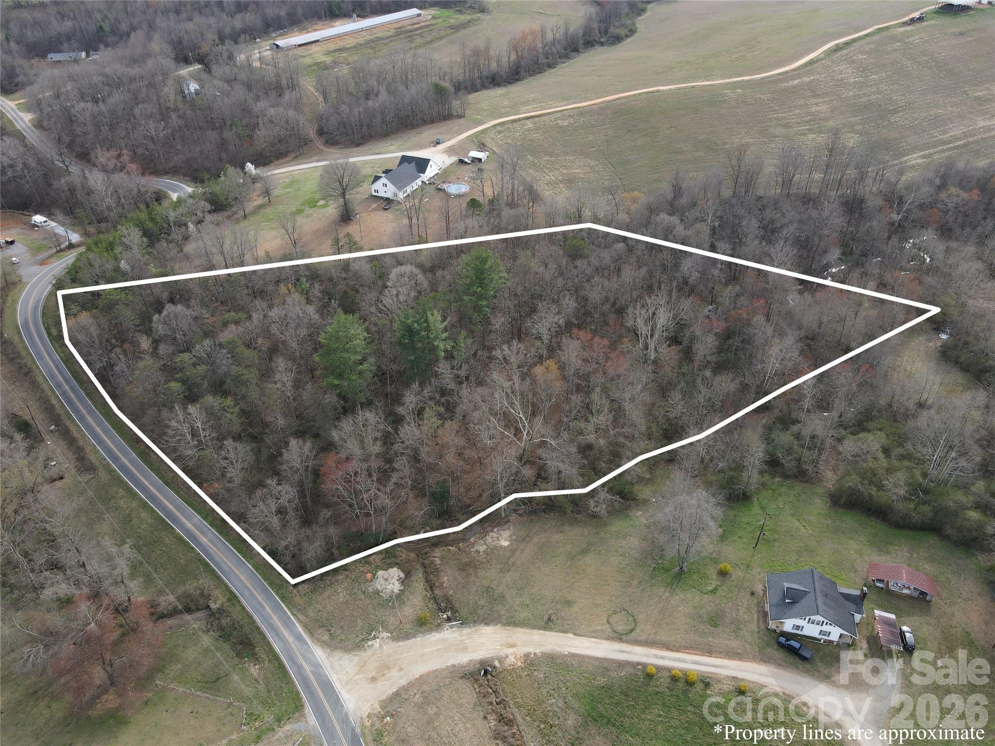 0 Vashti Road Hiddenite, NC 28636 - Photo 3 of 38 a view of a air conditioner from a window