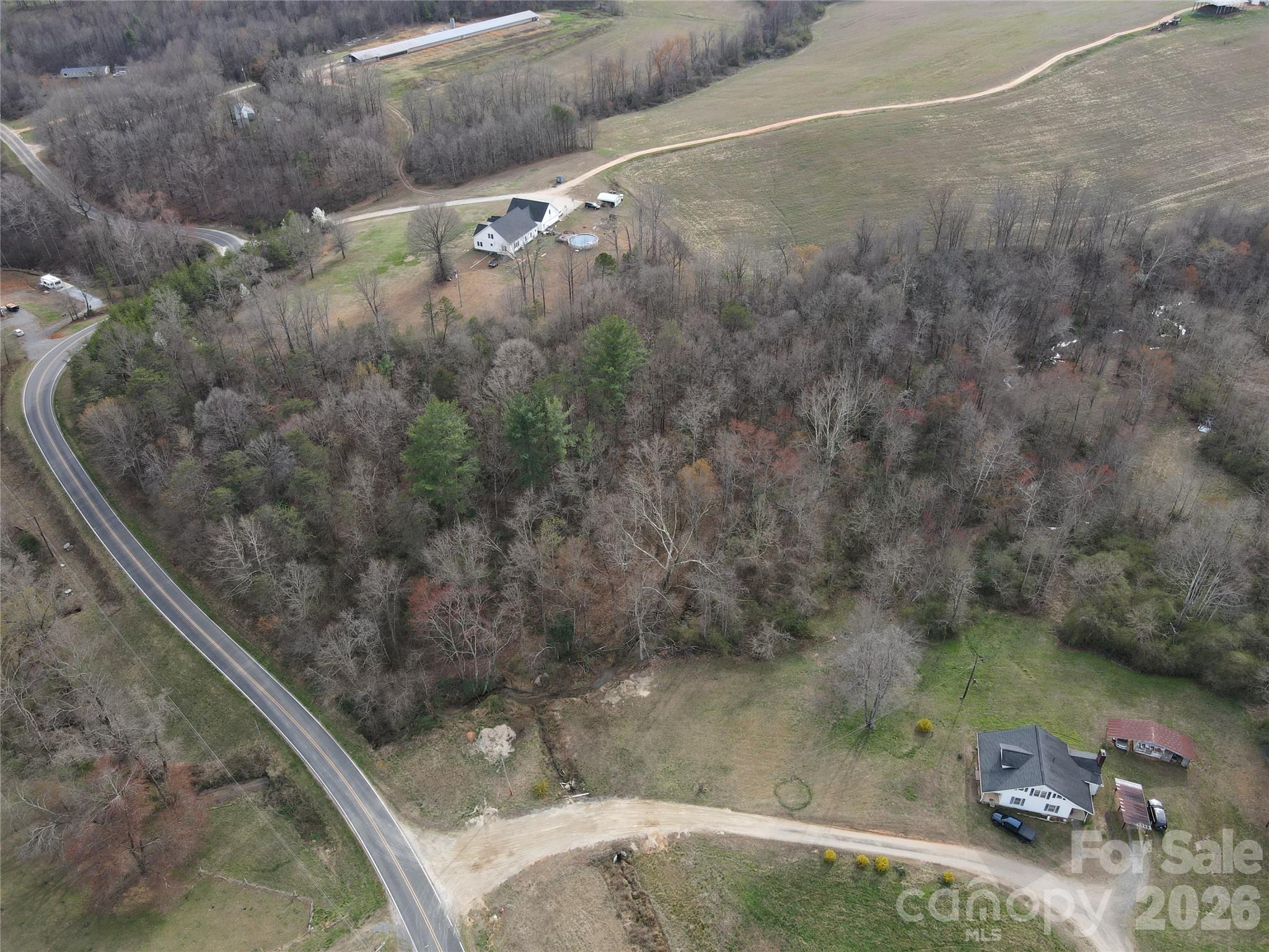 0 Vashti Road Hiddenite, NC 28636 - Photo 7 of 38 a view of a yard from a balcony