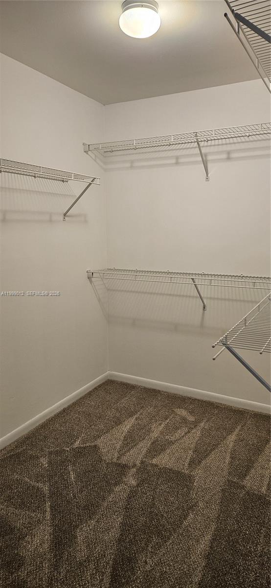 4020 Sabal Lakes Road Delray Beach, FL 33445 - Photo 26 of 40 Walk in master bedroom closet
