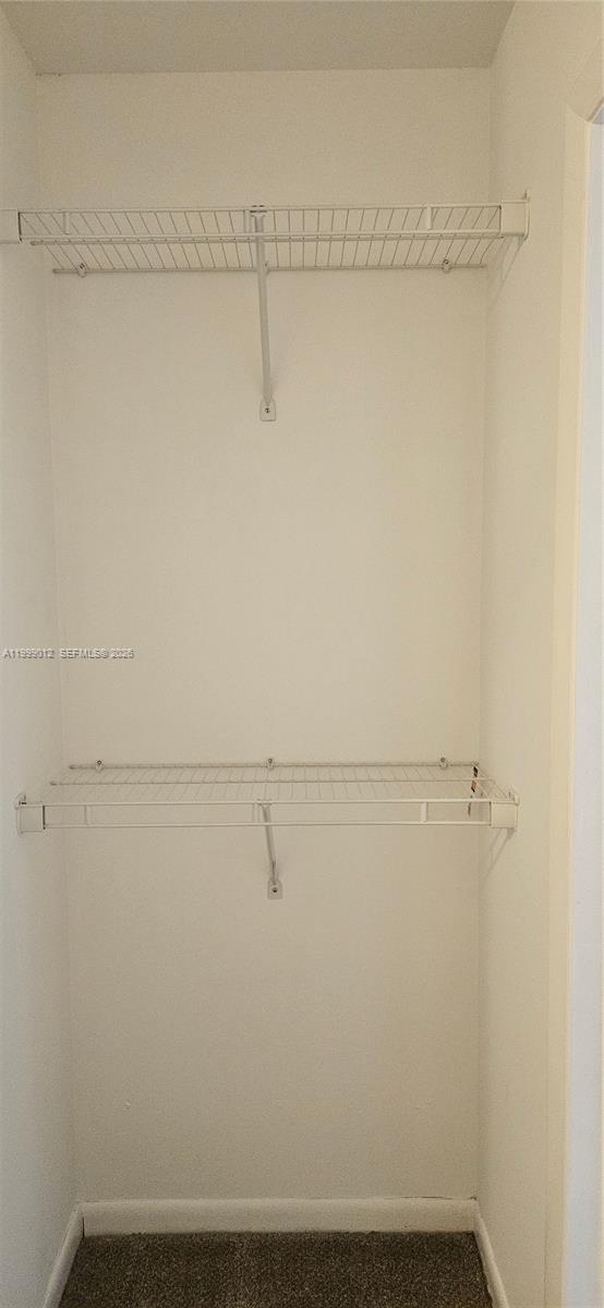 4020 Sabal Lakes Road Delray Beach, FL 33445 - Photo 27 of 40 Walk in master bedroom closet