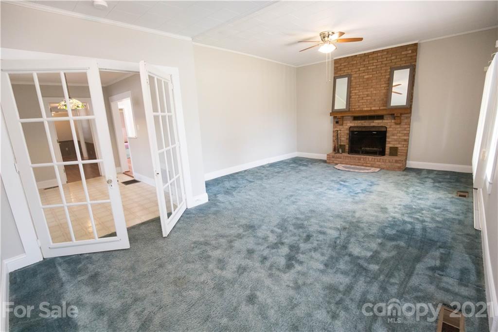 200 Hiddenite Church Road Hiddenite, NC 28636 - Photo 12 of 20 an empty room with windows
